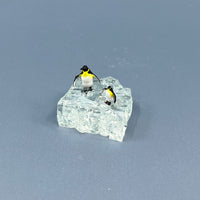 Penguins on Windshield Glass