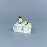 Penguins on Windshield Glass