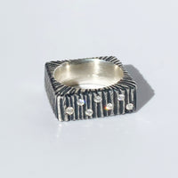 Vertical Dig Textured Ring with 7 Diamonds: Size 6.5